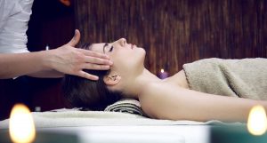Woman getting head massage